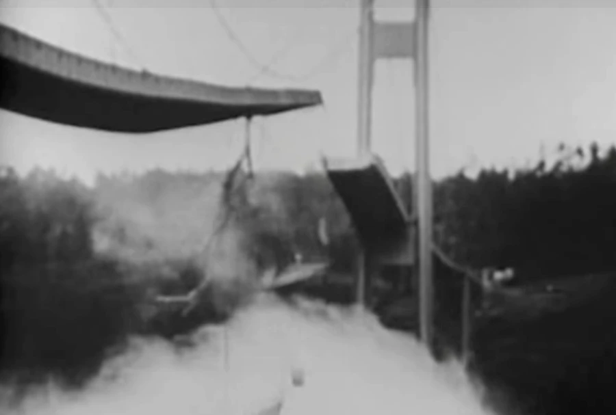 The Tacoma Narrows Bridge mid-collapse