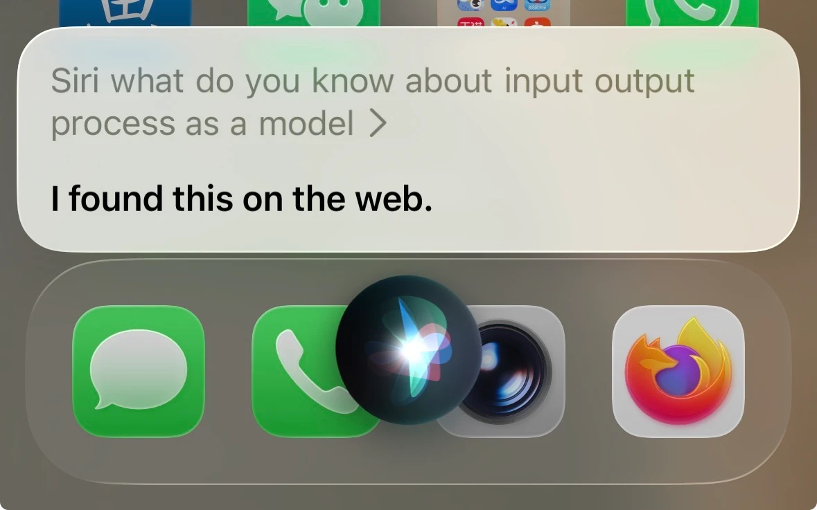An iPhone showing the Siri listening interface