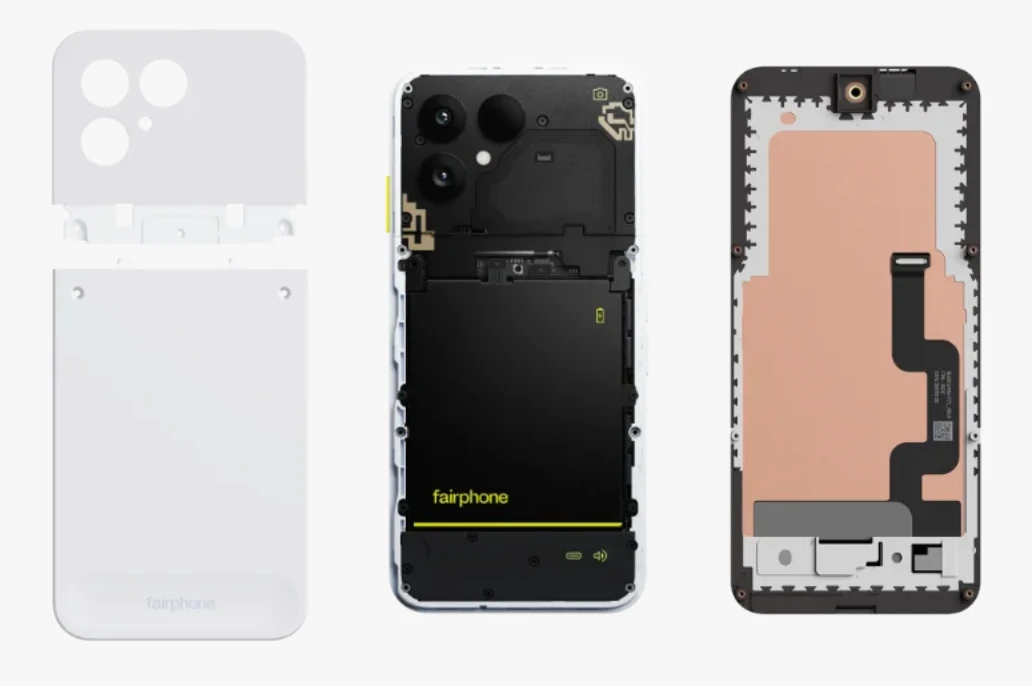 A Fairphone with its back cover removed showing a modular battery and components